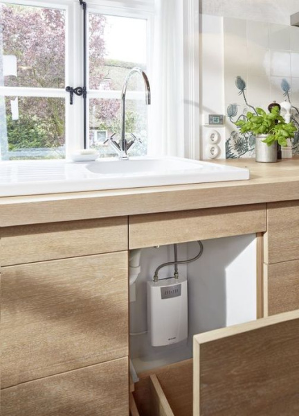 Электрический проточный водонагреватель 12 кВт Clage CFX-U